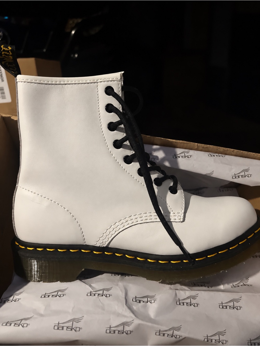 Dansko White Leather Lace-Up Boot with Black Laces and Yellow Stitching